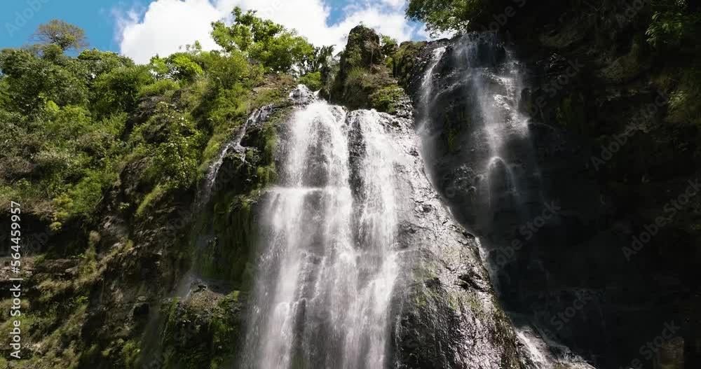 A tropical waterfall in the jungles. Balea Falls in the jungle. Negros, Philippines. A tropical waterfall in the jungles. Balea Falls in the jungle. Negros, Philippines.