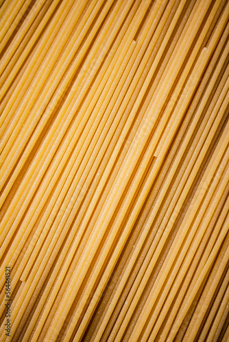 Unprepared spaghetti dry. Macro background.