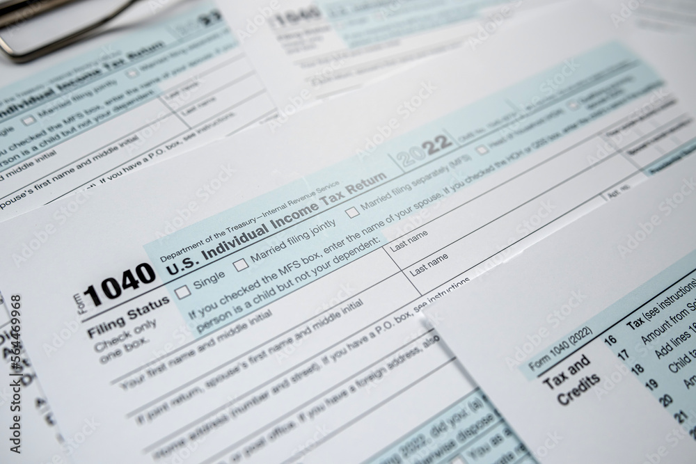 Blank 1040 individual income tax return on desk Blank 1040 individual income tax return on desk