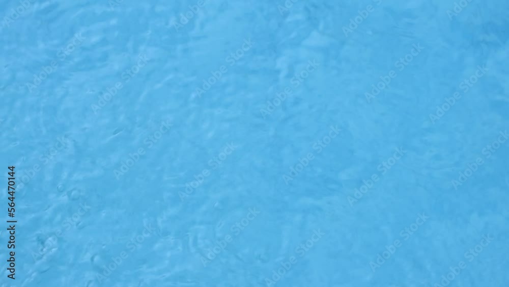 Close up water background texture in blue pool Close up water background texture in blue pool