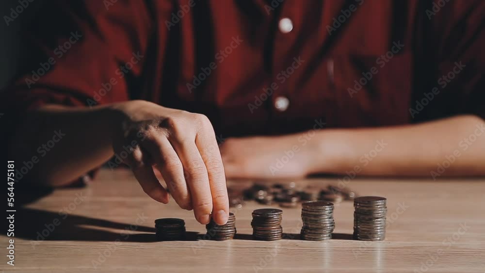 Business women put coin stack money and many bank note in office, Save money for future and Retirement. Business women put coin stack money and many bank note in office, Save money for future and Retirement.