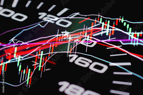 Data analyzing trading market.Speedometer with Futuristic Speed.Working set for analyzing financial statistics and analyzing a market data. Double exposure.Dark background.