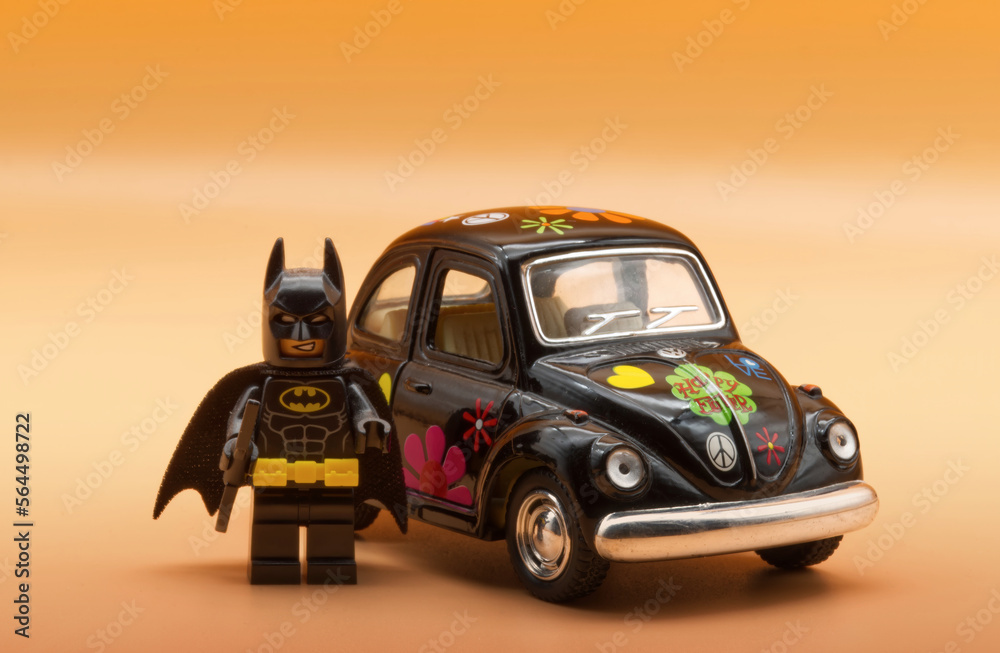 Bologna - Italy - January 47, 2023: Lego Batman ready for driving a vintage  Volkswagen Beetle painted in Hippie lifestyle. Stock Photo | Adobe Stock