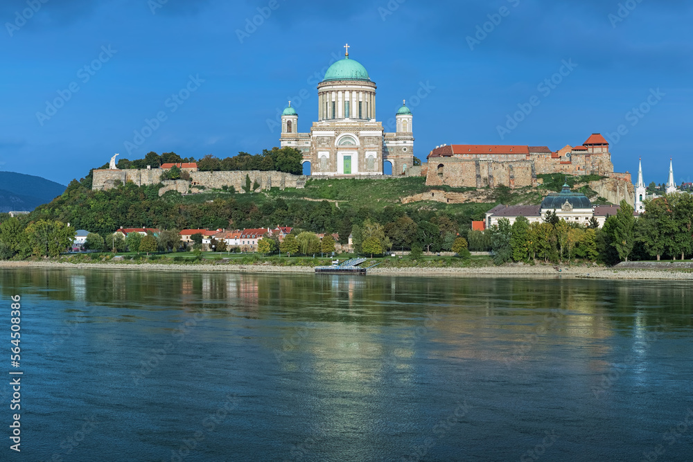 Esztergom, Hungary. Esztergom Basilica at Castle Hill. View from the opposite bank of the Danube. The Latin motto on the temple's frieze reads: Seek those things which are above.