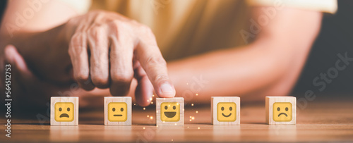 Male consumers rate their satisfaction and rate and review them online. Customer Experience Survey Concepts for Services and Products and Customer Engagement