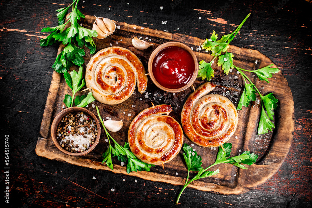 Grilled sausages with parsley and tomato sauce. Grilled sausages with parsley and tomato sauce.