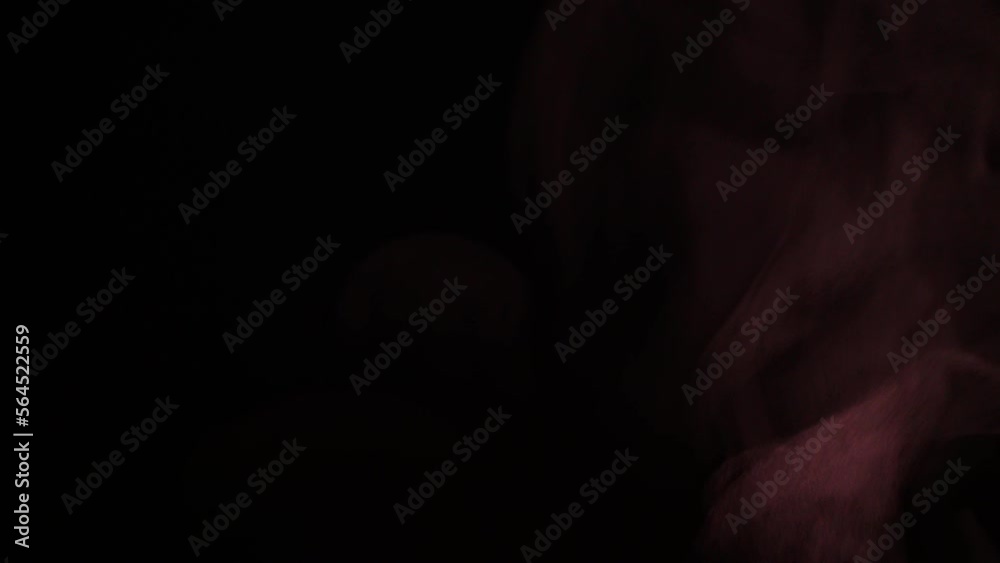 Black background, shimmering red eerie steam, can be used for compositing, effects, etc. Black background, shimmering red eerie steam, can be used for compositing, effects, etc.