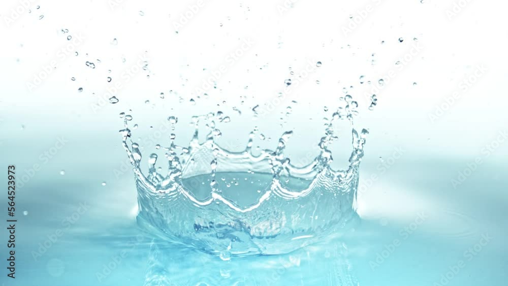 Super Slow Motion Shot of Water Crown Splash on Ligh Blue Background at 1000fps. Super Slow Motion Shot of Water Crown Splash on Ligh Blue Background at 1000fps.