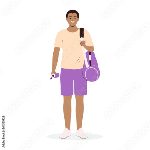 Young African American man holding gym bag and bottle of water