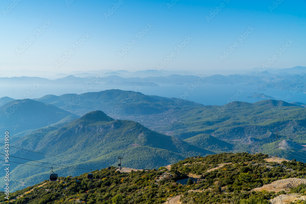 Aerial panoramic view of the stunning landscapes of Oludeniz, Turkey with cable cars Aerial panoramic view of the stunning landscapes of Oludeniz, Turkey with cable cars
