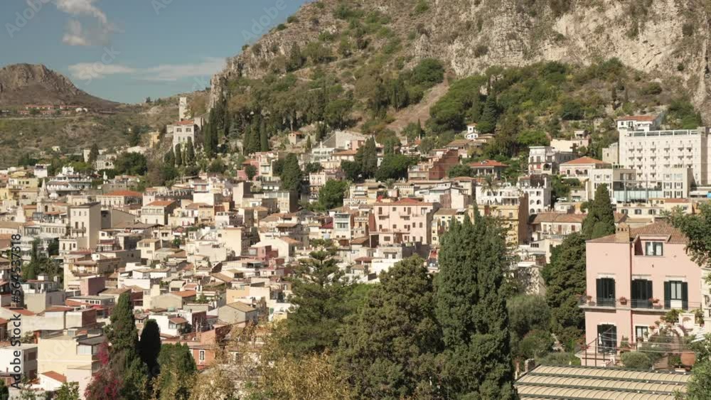Taormina from the Greek Theatre with Mount Etna in the background, Taormina, Messina, Sicily Taormina from the Greek Theatre with Mount Etna in the background, Taormina, Messina, Sicily