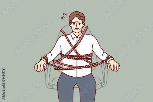 Man in business clothes is tied to office chair and feels fear or despair due to strict deadlines or impossible tasks. Concept overworking and psychologically difficult work. Flat vector image