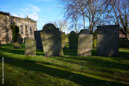 Gravestones in a cemetery at Ratcliffe on Soar, Nottinghamshire, UK photo