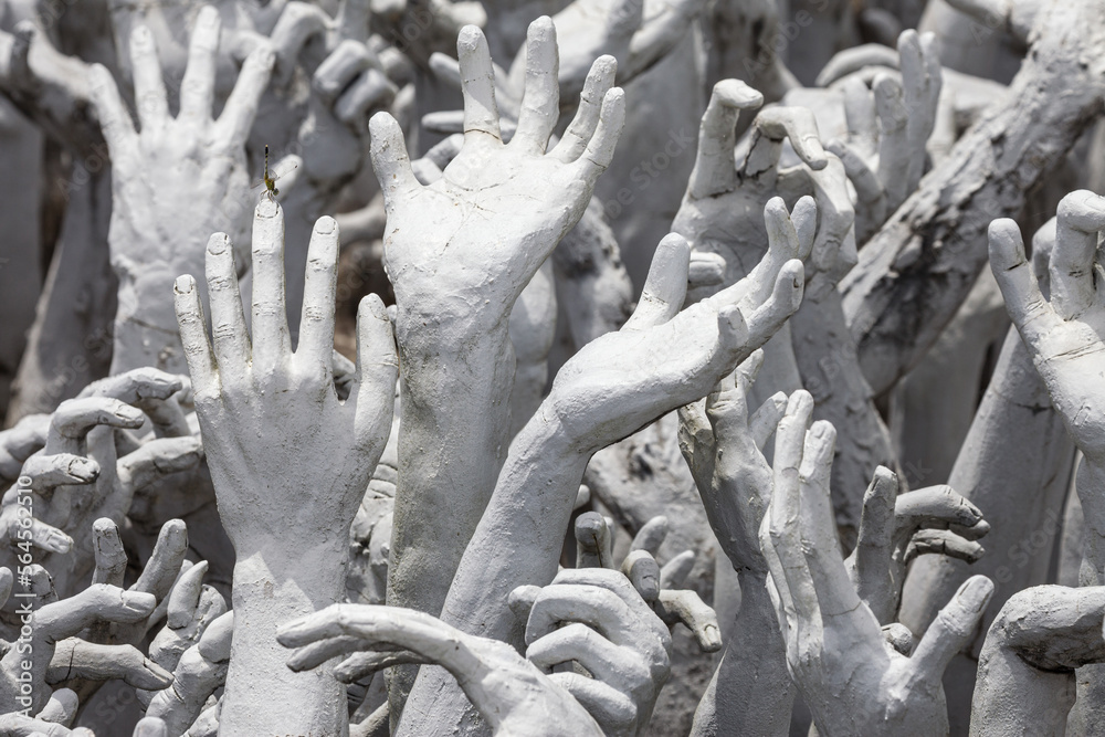Hands Pleading for Help at Wat Rong Khun