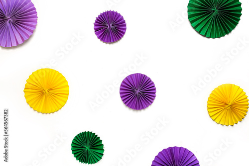 Mardi gras.Holidays mardi gras masquarade  venetian mask fan over purple background. view above mardi gras background copy space Happy Mardi Gras . Fat Tuesday carnival texture golden green purple