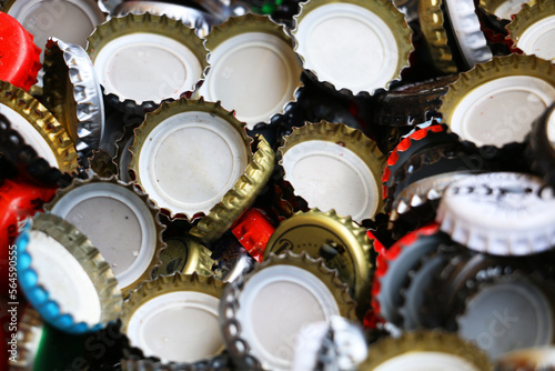 selective focus: Old historic colorful Soda bottle caps from the 1980s
