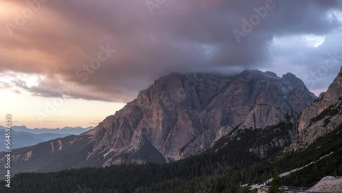 Sunset over Conturines Mountain in the Dolomites with colored clouds, Dolomites photo