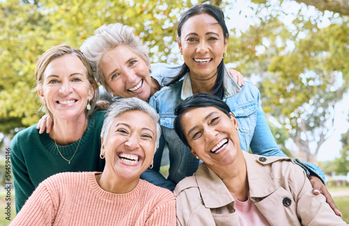 Smile  park and portrait of group of women enjoying bonding  quality time and relax in nature together. Diversity  friendship and faces of happy senior females with calm  wellness and peace outdoors
