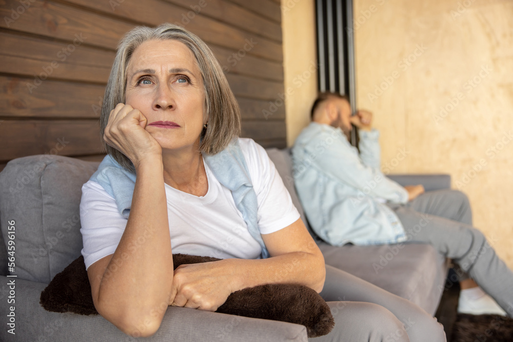 Couple looking upset and stressed after the argument Couple looking upset and stressed after the argument