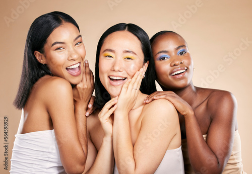 Happy women, portrait smile and diverse beauty for skincare, cosmetics or makeup against a studio background. Female friends or model face smiling in happiness for fun healthy skin treatment