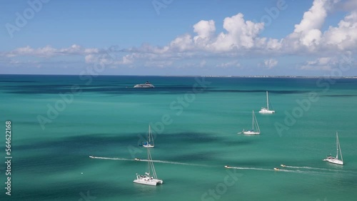 St Maarten Caribbean Marigot Marina Fort Louis yachts jetski. French side of island. Cruise ship vacation destination. Resort, yacht, sailboat harbor and marina.  photo