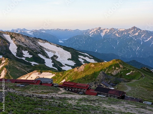 View of Northern Alps mountains from Mt. Shirouma on a morning in July. Hakuba Village, Nagano Prefecture, Japan photo