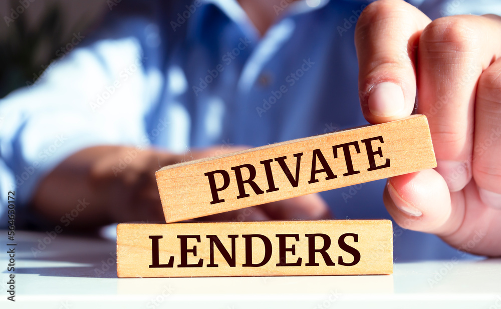 Close up on businessman holding a wooden block with 