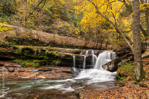 Found near the abandoned mining town of Thurmond, West Virginia is a hidden waterfall named Dunloup Creek Falls. Here is it shown during Autumn. 