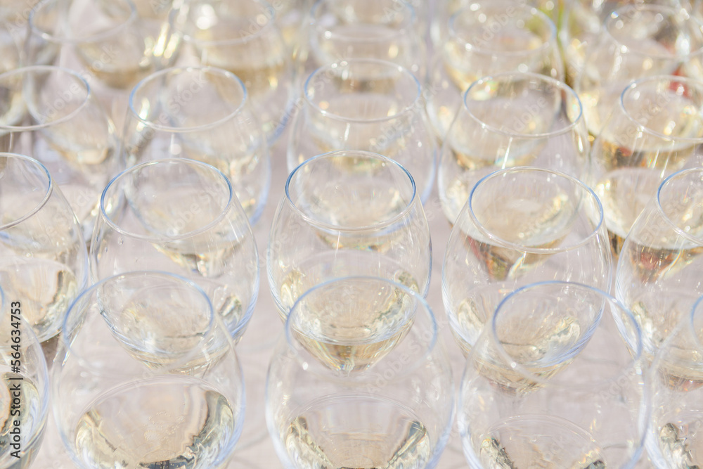 Row of glasses filled with champagne. Bar counter. Banquet Row of glasses filled with champagne. Bar counter. Banquet