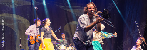 Photography A rock band playing on the concert stage at summer night