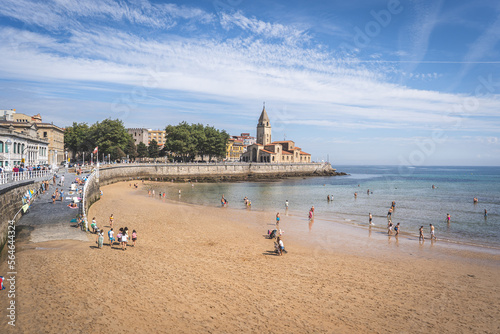 Summer day in San Lorenzo beach in the city of Gijon, Spain