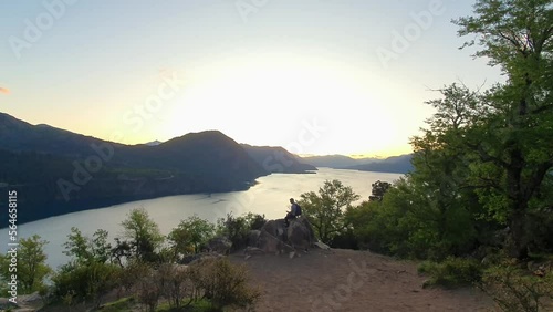 panoramic sunset view from the top of the mountain overlooking patagonia lake