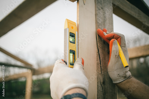 tools in hand  on a wooden background