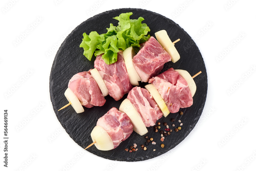 Raw pork skewers, ready to cook, BBQ, isolated on white background.