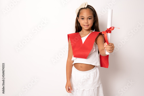 Little child girl holding diploma in isolated white background.