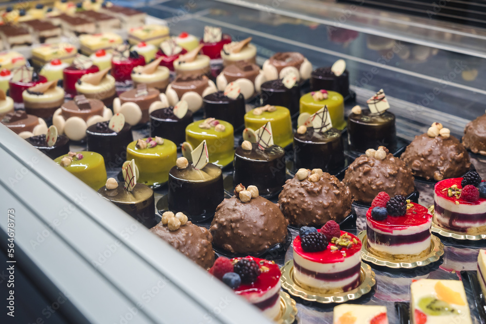 Italian Bakery counter, Window of desserts at a pastry shop. Fresh and tasty products