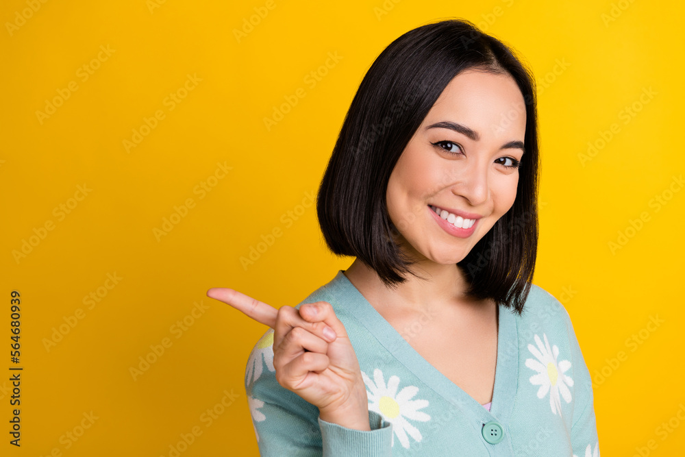 Photo of lovely cute glad lady wear stylish clothes arm presenting empty space news opening boutique isolated on yellow color background Photo of lovely cute glad lady wear stylish clothes arm presenting empty space news opening boutique isolated on yellow color background