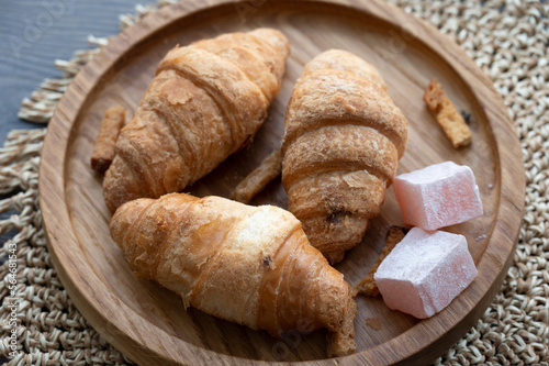 Croissants and Turkish delight on the table in the kitchen 
