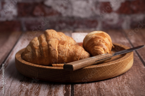 Croissants lie on the table in the kitchen 
