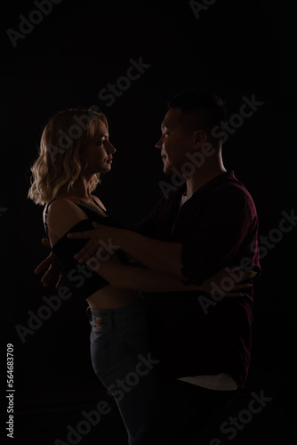 a couple in love dances a man and a woman in a bachata latina kizomba dance © dmitriisimakov