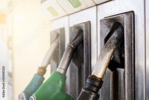 Service gas station with fuel, oil, gasoline and diesel. Close-up of a gas pump fueling gun. Petrol station.