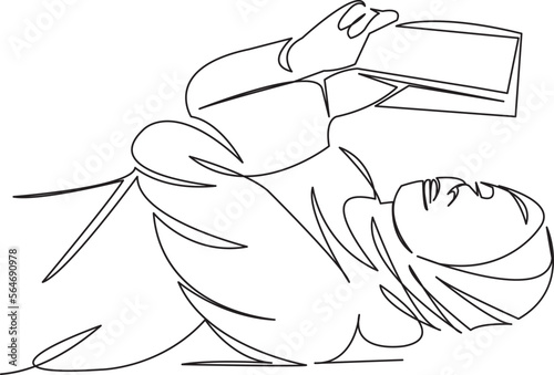 muslim girl reading lying down