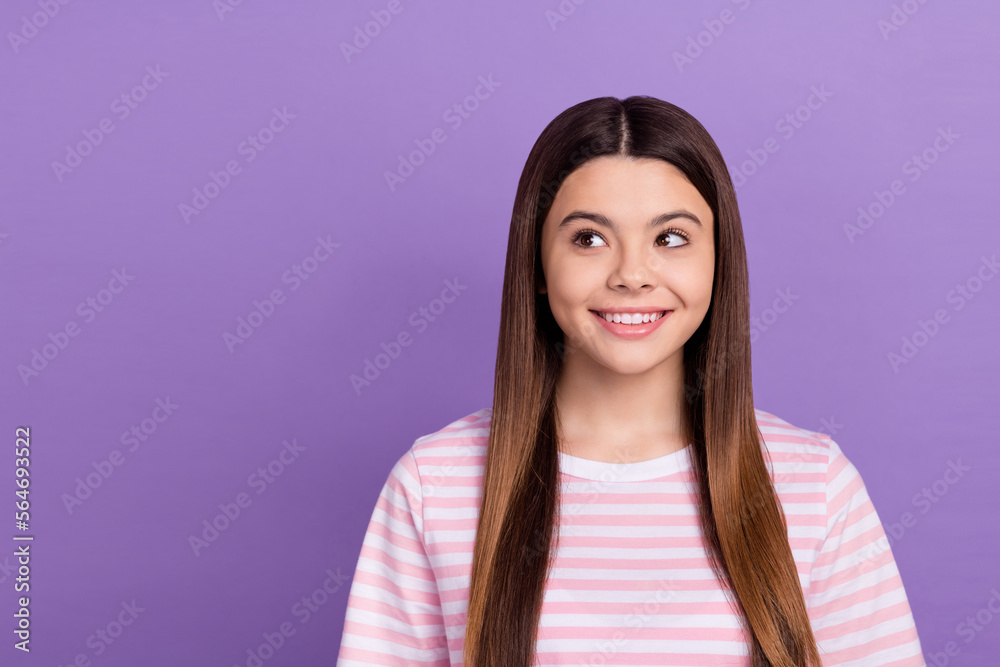 Photo of adorable dreamy young lady wear striped pink white t-shirt looking empty space isolated violet color background Photo of adorable dreamy young lady wear striped pink white t-shirt looking empty space isolated violet color background
