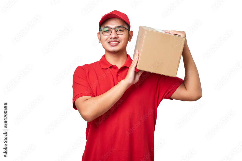 Smiling asian courier in red uniform holding package on shoulder, give client their order Smiling asian courier in red uniform holding package on shoulder, give client their order