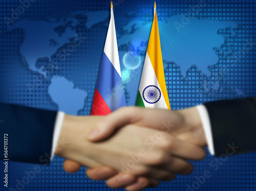 Two person shaking hands in front Indian,Russian flags.India,Russia bilateral relation concept background