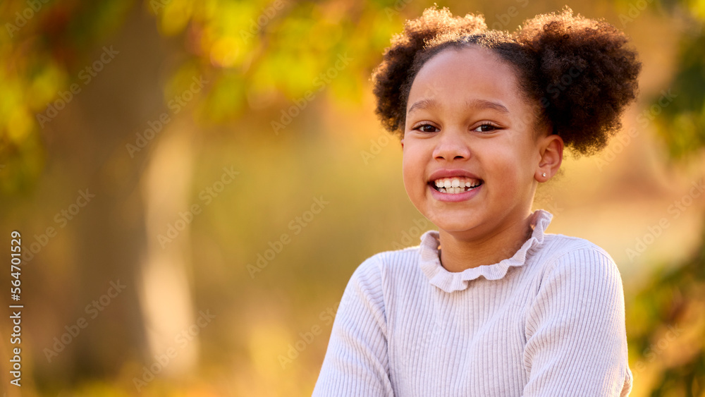 Head And Shoulders Portrait Of Smiling Young Girl Outdoors In Countryside Head And Shoulders Portrait Of Smiling Young Girl Outdoors In Countryside