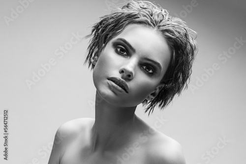 Monochrome glamor portrait of young women. Young sensual model girl posing in studio.