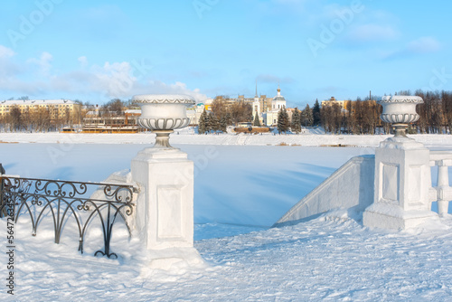 View of the Afanasy Nikitin embankment from the opposite bank of the Volga. View of the winter embankment of the city of Tver.