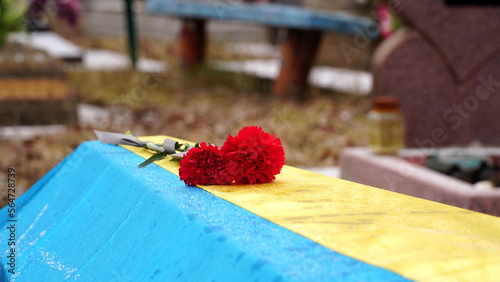 Ukraine. War. The funeral ceremony of a soldier. Funeral ceremony. The funeral of Ukrainian soldiers who died during the Russian invasion of Ukraine. Coffin decorated with flowers