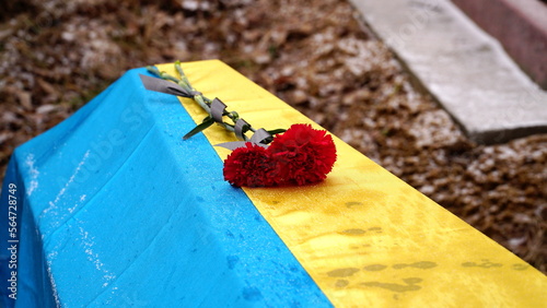 Ukraine. War. The funeral of Ukrainian soldiers who died during the Russian invasion of Ukraine. Coffin decorated with flowers. The funeral ceremony of a soldier. Funeral ceremony